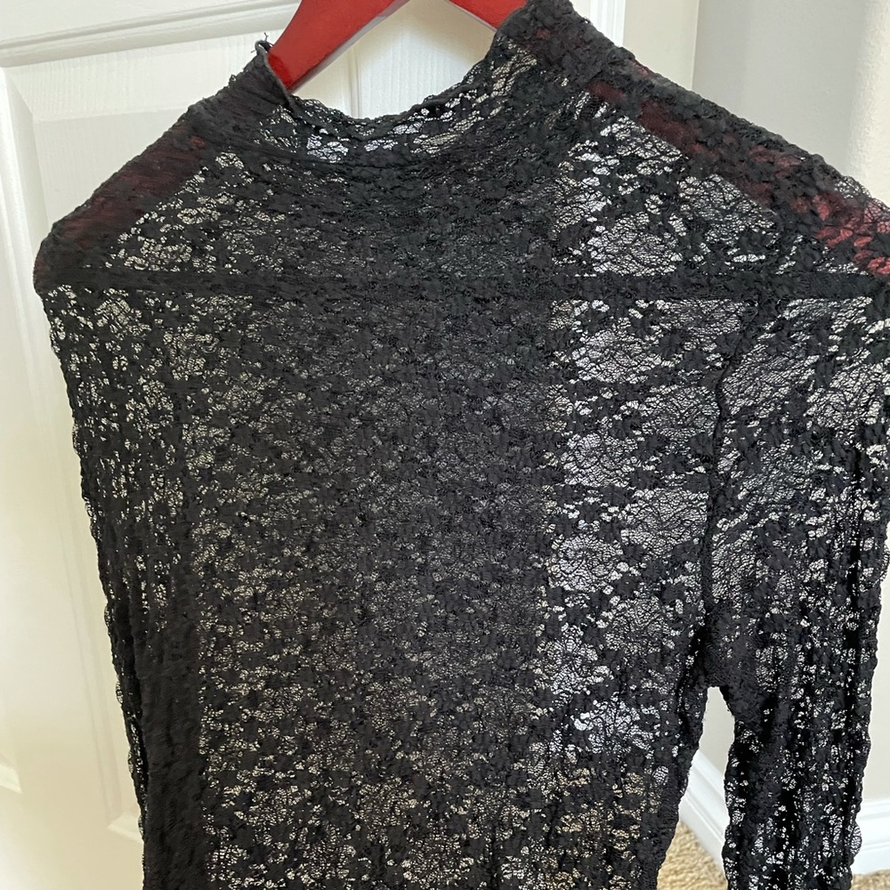 Bebe Black lace blouse, worn twice.  Nice condition